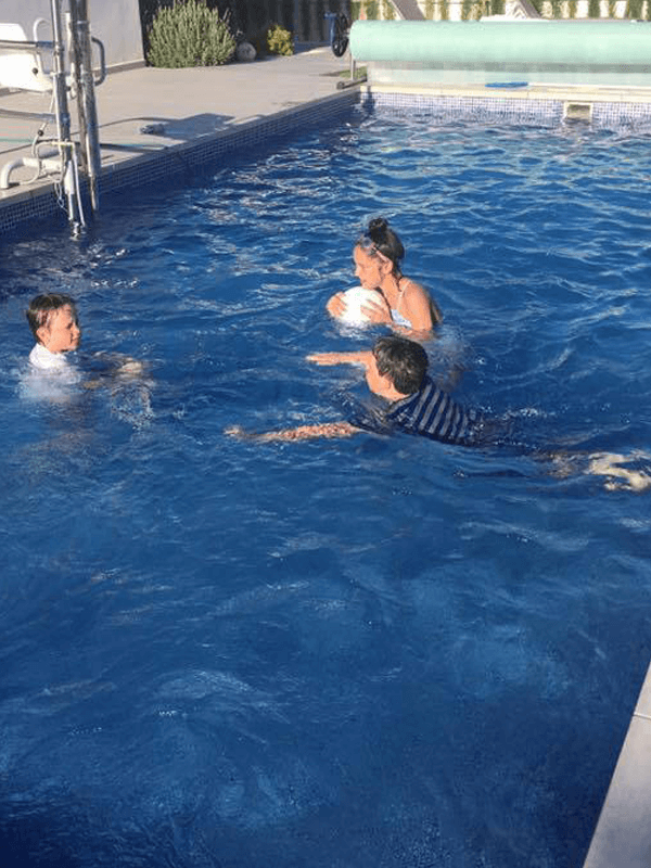 Kids enjoying the swimming pool at Villa Olivo