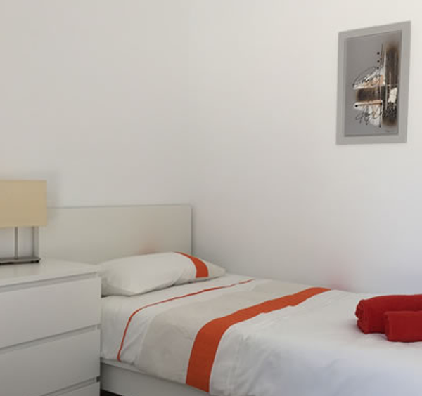 Twin bedroom at Villa Olivo